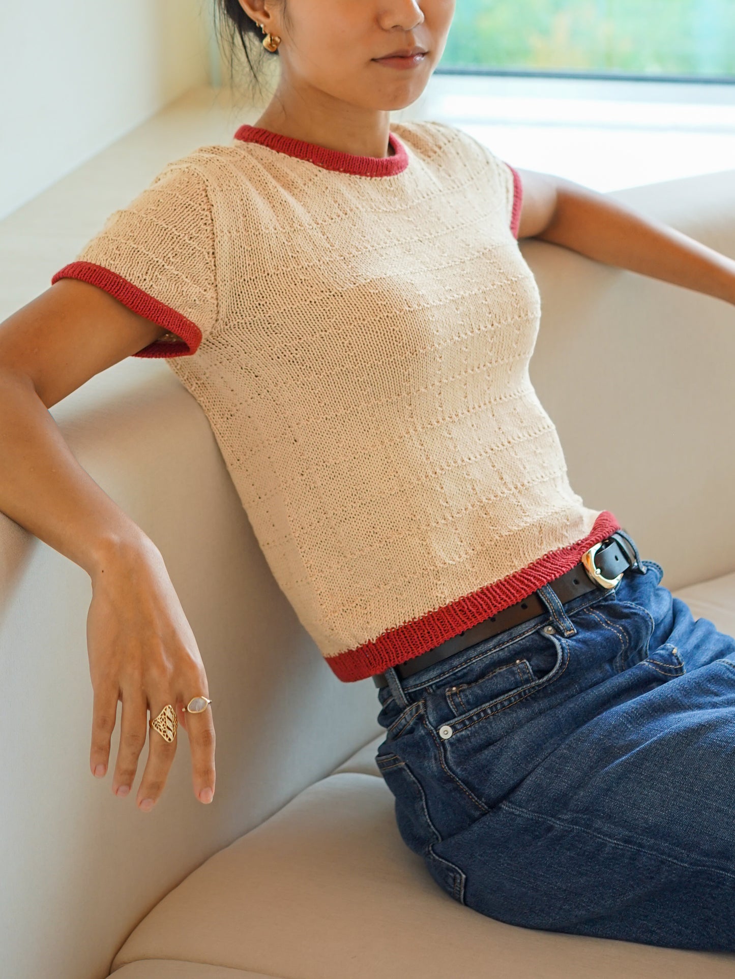 The Nancy Tee styled, seated
